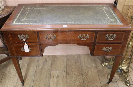 An Edwardian inlaid mahogany writing table, W.106cm